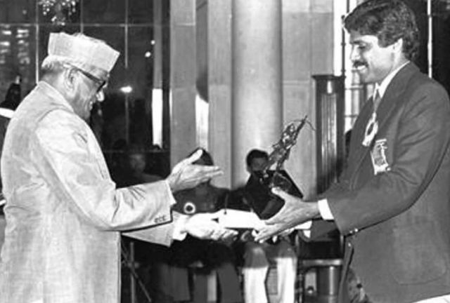 Kapil Dev receiving the Arjun Award from the then President Sanjiva Reddy